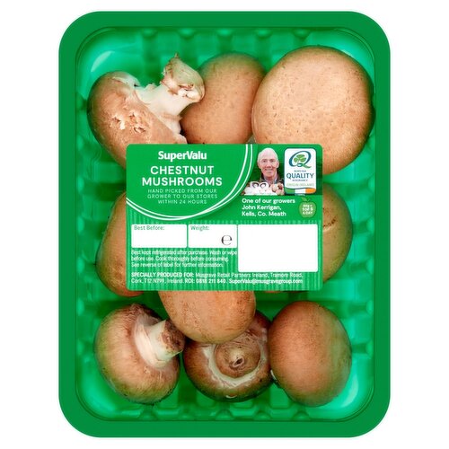 Prepacked mushrooms in a punnet covered with clear plastic