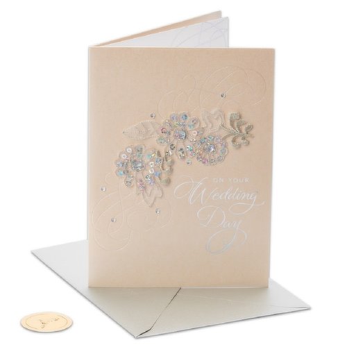 Inside card reads: "Here's to a beautiful day of happiness and a wonderful life of love. Congratulations". Card comes with an envelope sticker.