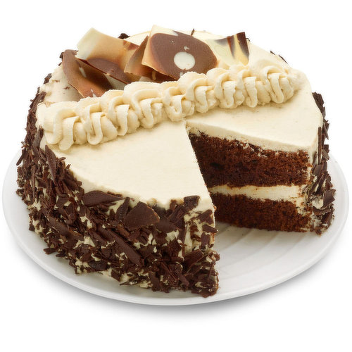 Two layers of moist Guinness Draught-infused Chocolate sponge filled & covered with smooth Guinness real whip cream. Decorated with marbled chocolate decor. 6in cake.