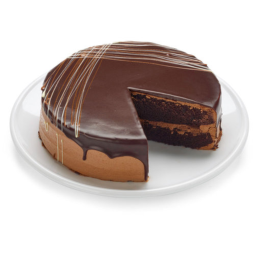 Fluffy and moist chocolate cake filled with creamy chocolate ganache, frosted with whipped chocolate ganache and topped with a chocolate drip. This cake is dark and rich and not for the faint of heart!