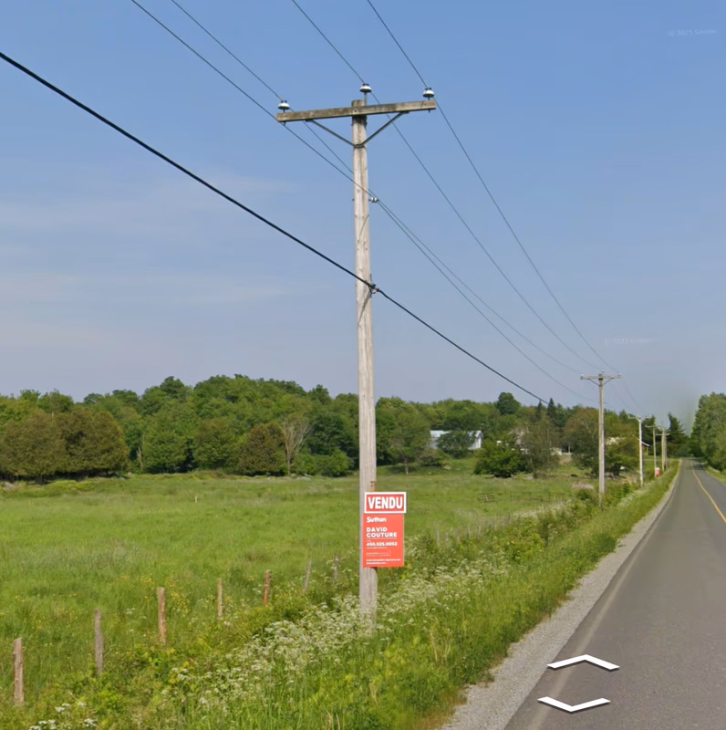 Québec / New Brunswick - T pole — how it looks in GeoGuessr
