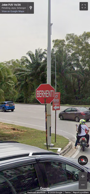 Malaysia clue: Stop BERHENTI sign 