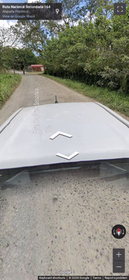 Costa Rica clue: Generation 4 white pickup car with black antenna