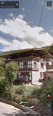 Bhutan clue: Tin-roofed houses