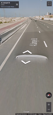 UAE clue: White/silver car