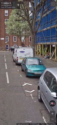 United Kingdom clue: British White-Yellow License Plates