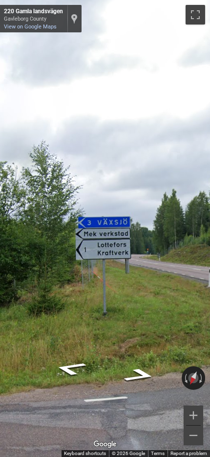 Swedish blue direction sign with white text and border, showing a thin arrow pointing left.