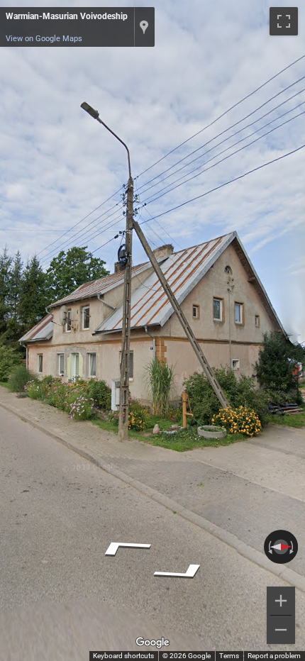 Polish concrete utility poles featuring small holes that do not reach the ground.