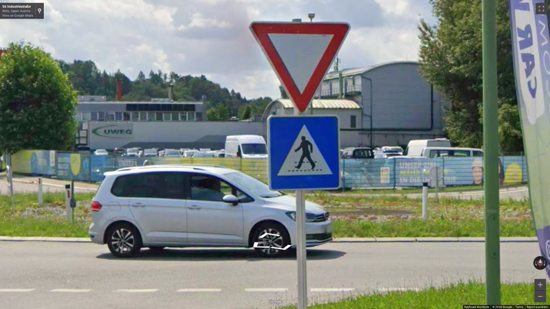 Pedestrian crossing sign in Austria — how it looks in GeoGuessr