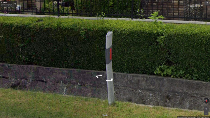 Bollard with red reflector