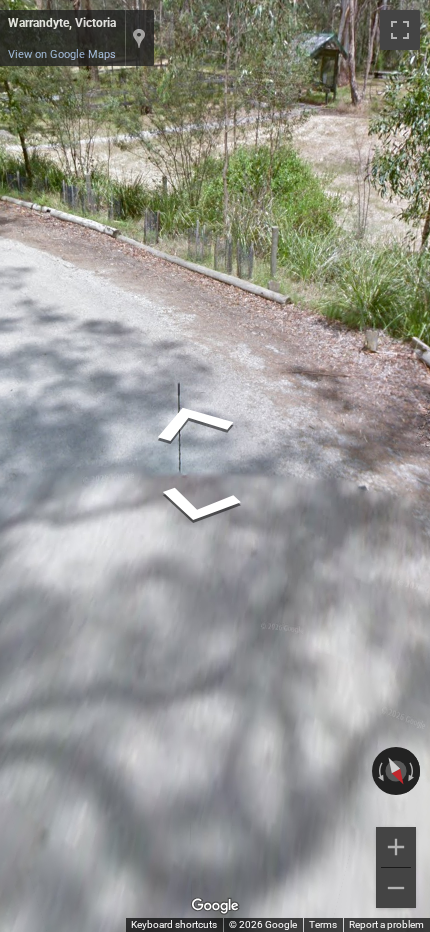 Australian GeoGuessr car from Generation 3, viewed from the rear, showing a distinct long antenna.