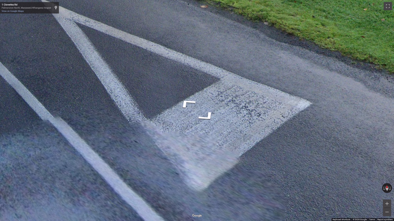 White Triangle Road Marking — how it looks in GeoGuessr