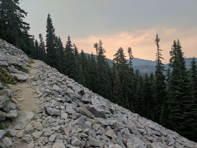 Rocks, clouds, and smoke.