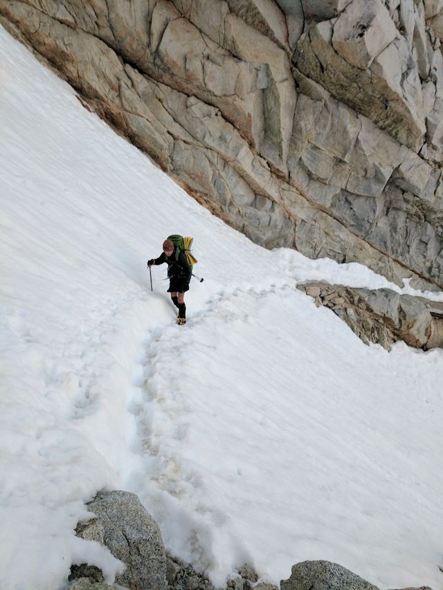 Peanut traversing the chute just below the cornice. Don't slip here!