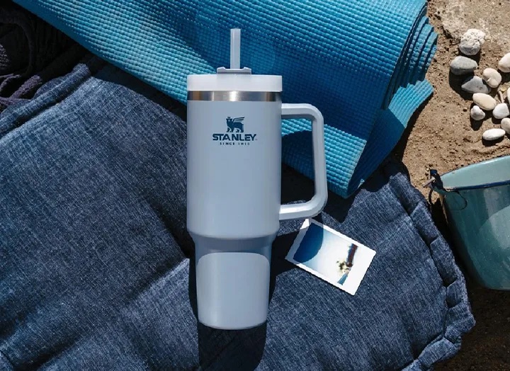 A blue Stanley tumbler on a blue yoga mat, Stanley Speaks Out on Claims That Their Water Bottles Contain Lead