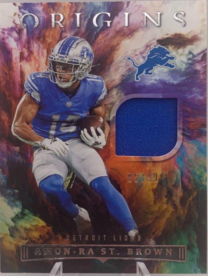 Amon Ra St. Brown #FF-AST Football Cards 2022 Panini Origins Future Fabrics