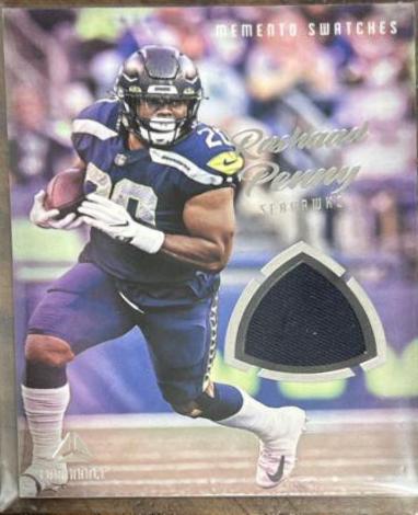 Rashaad Penny #MSW-RPE Football Cards 2022 Panini Luminance Memento Swatches