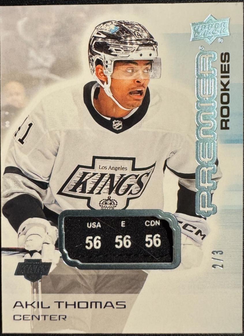 Akil Thomas [Platinum Blue Neckline] #145