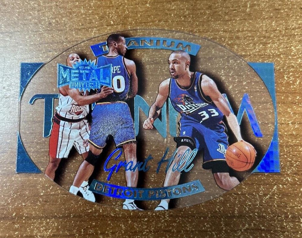 Grant Hill #12 Basketball Cards 1997 Metal Universe Titanium