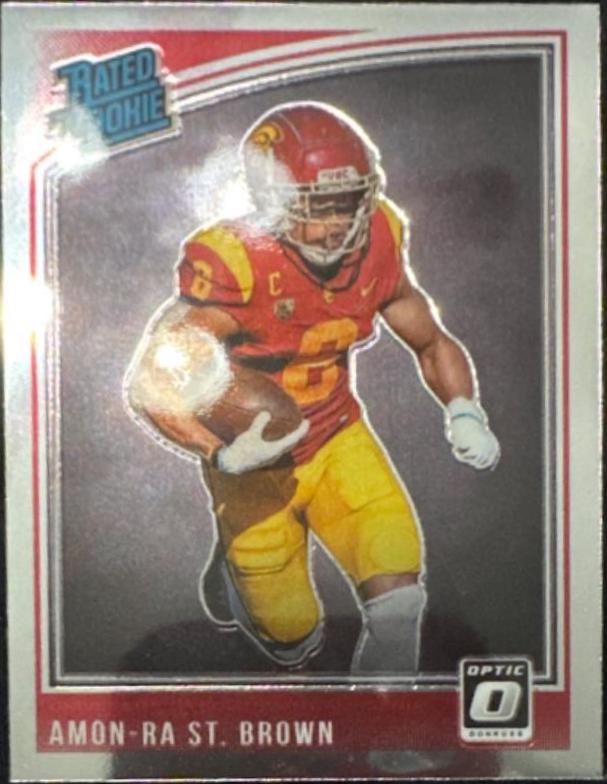 Amon-Ra St. Brown #224 Football Cards 2021 Panini Chronicles Draft Picks Donruss Optic Rated Rookie