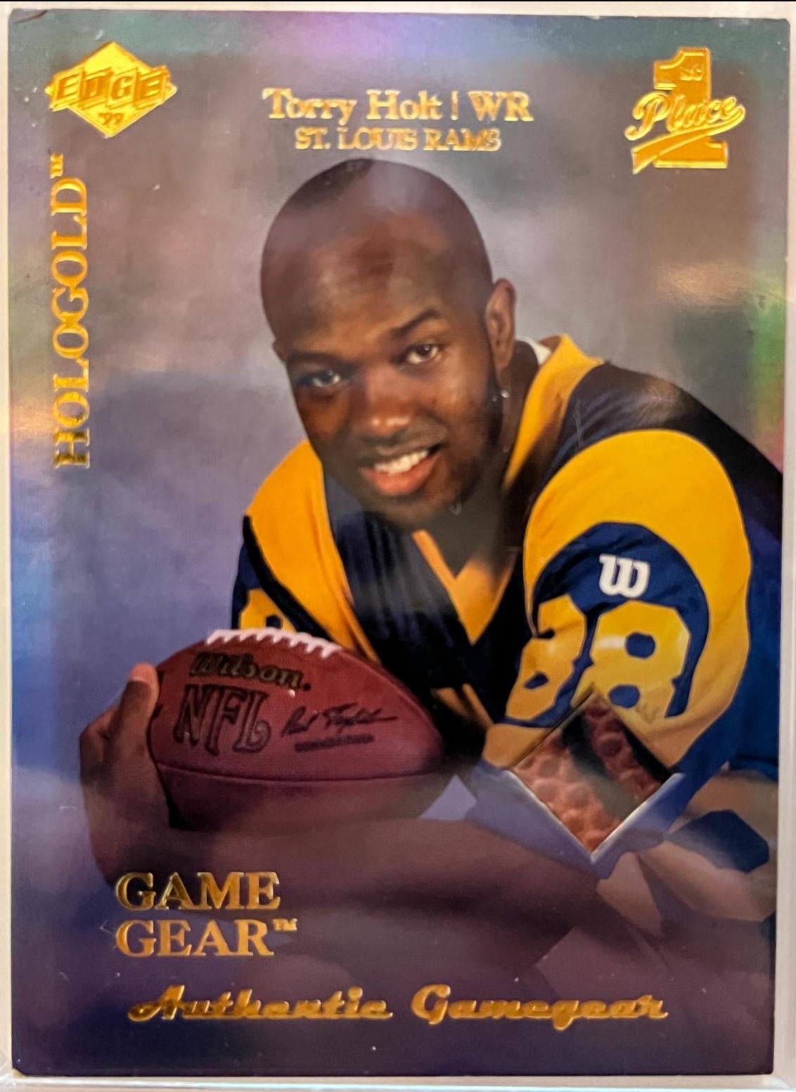 Torry Holt #RG8 Football Cards 1999 Collector's Edge 1st Place Rookie Game Gear