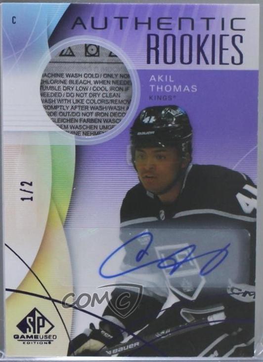 Akil Thomas [Purple Auto Sponsor Logo Patch] #275