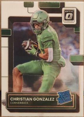 Christian Gonzalez #8 Football Cards 2023 Panini Chronicles Draft Picks Donruss Optic Rated Rookie