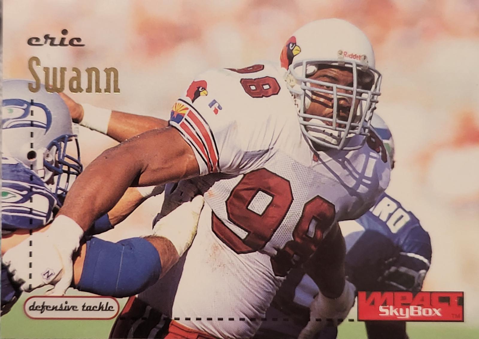 Eric Swann #4 Football Cards 1996 Skybox Impact