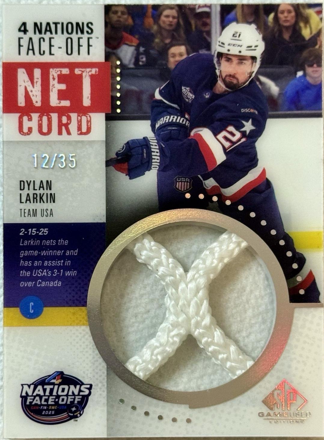 Dylan Larkin #4NN-DL 2025-26 SP Game Used Hockey 2025 4 Nations Face-Off Net Cord Relics