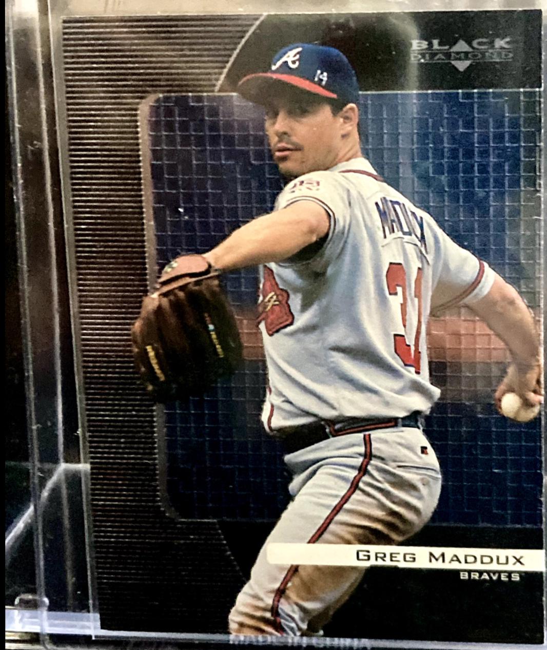 Greg Maddux #9 Baseball Cards 1999 Upper Deck Black Diamond