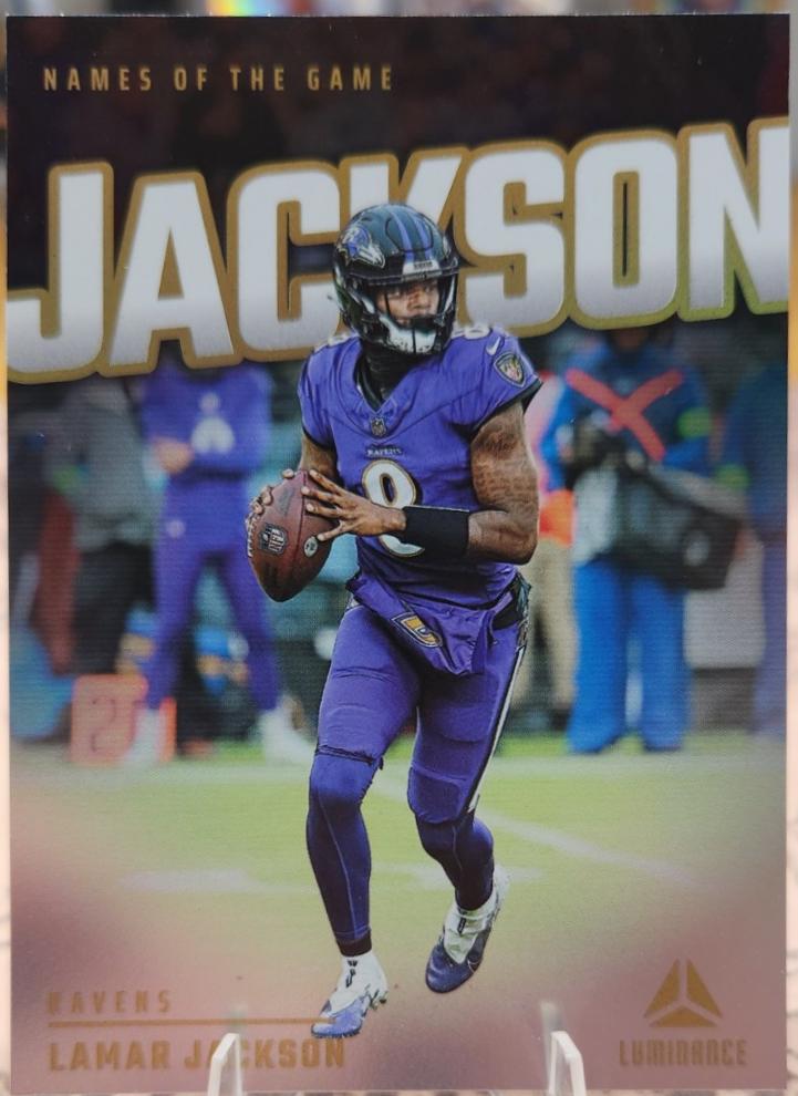 Lamar Jackson #NG-LJN Football Cards 2024 Panini Luminance Names of the Game