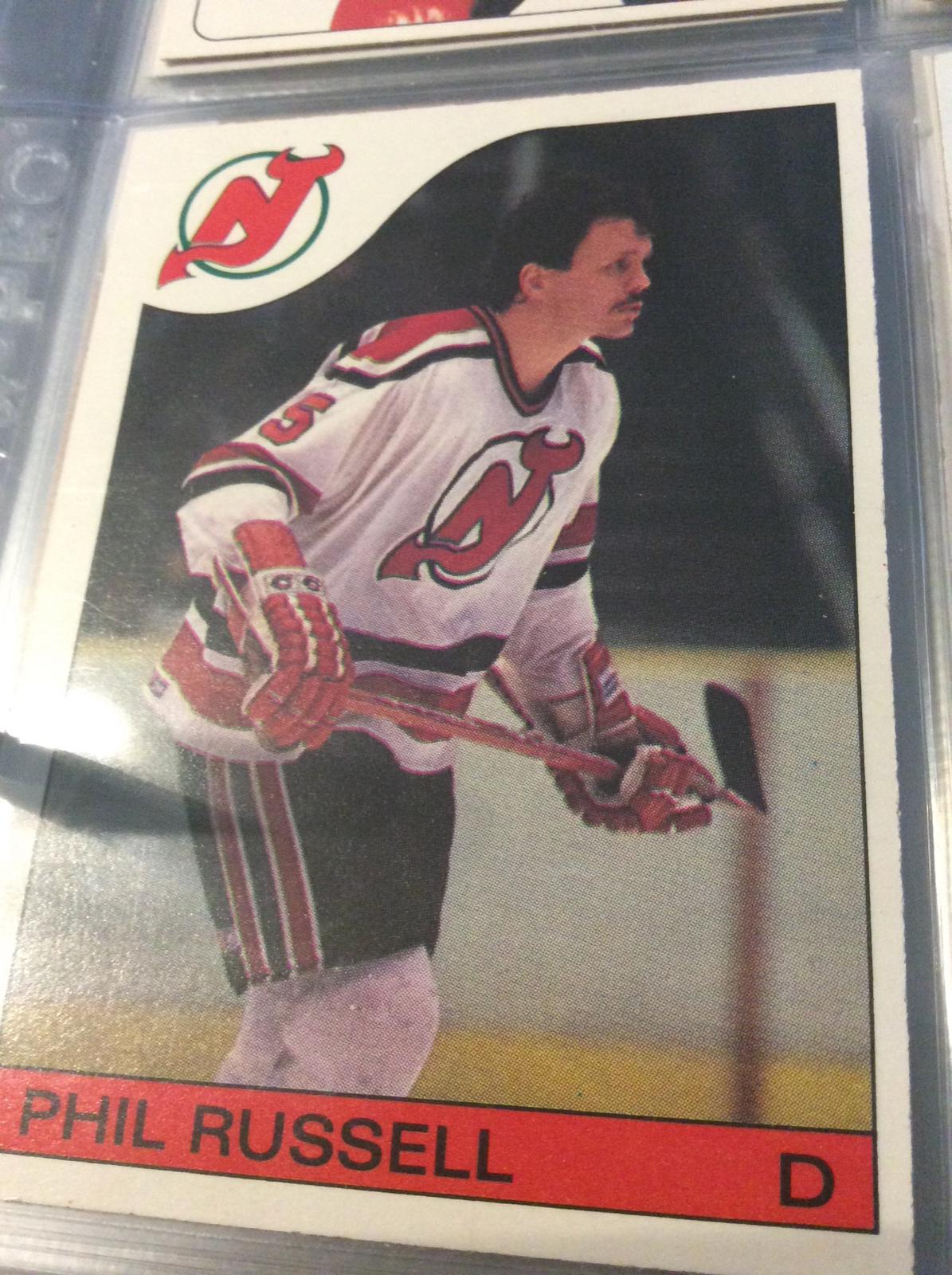 Phil Russell #30 Hockey Cards 1985 O-Pee-Chee