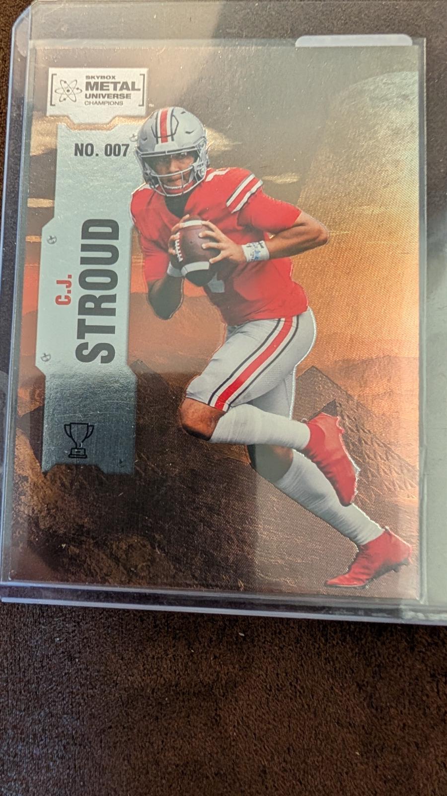 C.J. Stroud #7 Football Cards 2024 SkyBox Metal Universe Champions