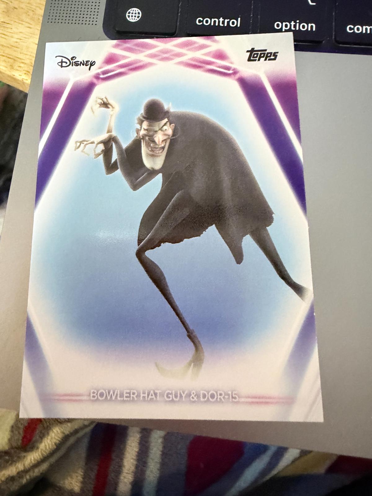 Bowler Hat Guy & DOR-15 #142 Prices | 2026 Topps Disney Neon