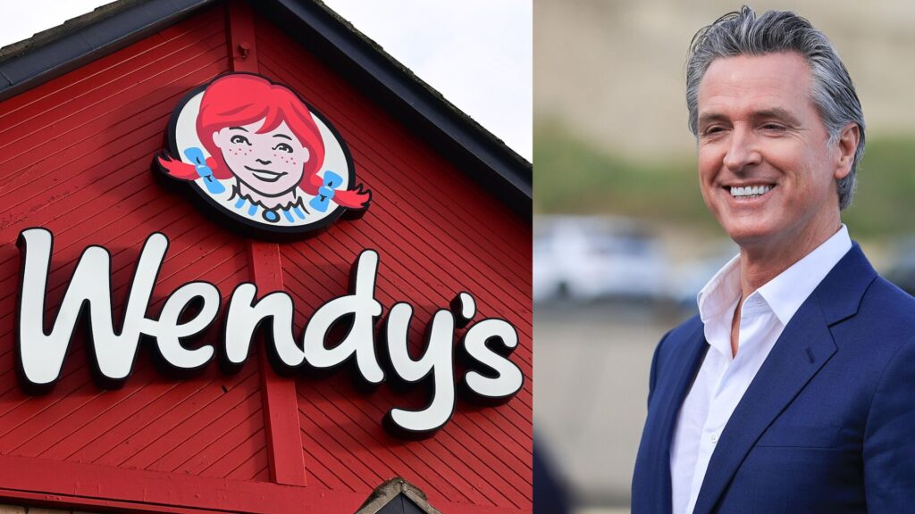 The image is split into two sections. On the left is the iconic Wendy's fast-food restaurant logo featuring a smiling redhead girl with pigtails against a red background with the restaurant's name in white, bold letters. On the right is a portrait of California Governor Gavin Newsom, smiling and dressed in a dark suit with a white shirt and no tie