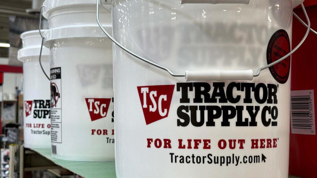 A bucket branded with the logo for Tractor Supply.