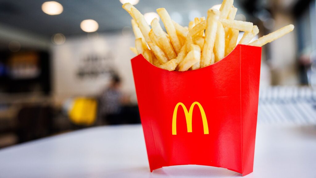 A close-up of McDonald’s fries in a red carton.