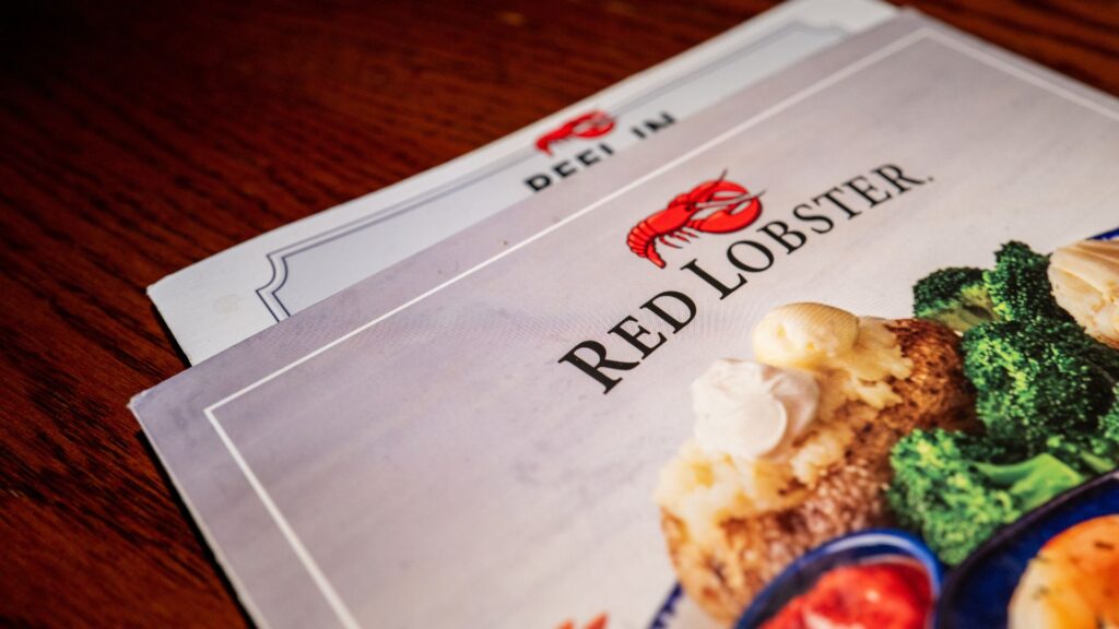 A close-up of a Red Lobster menu on a table.