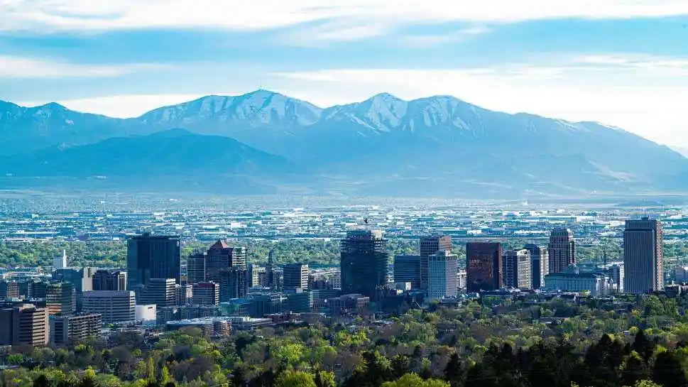 City Skyline Surrounded by Mountains