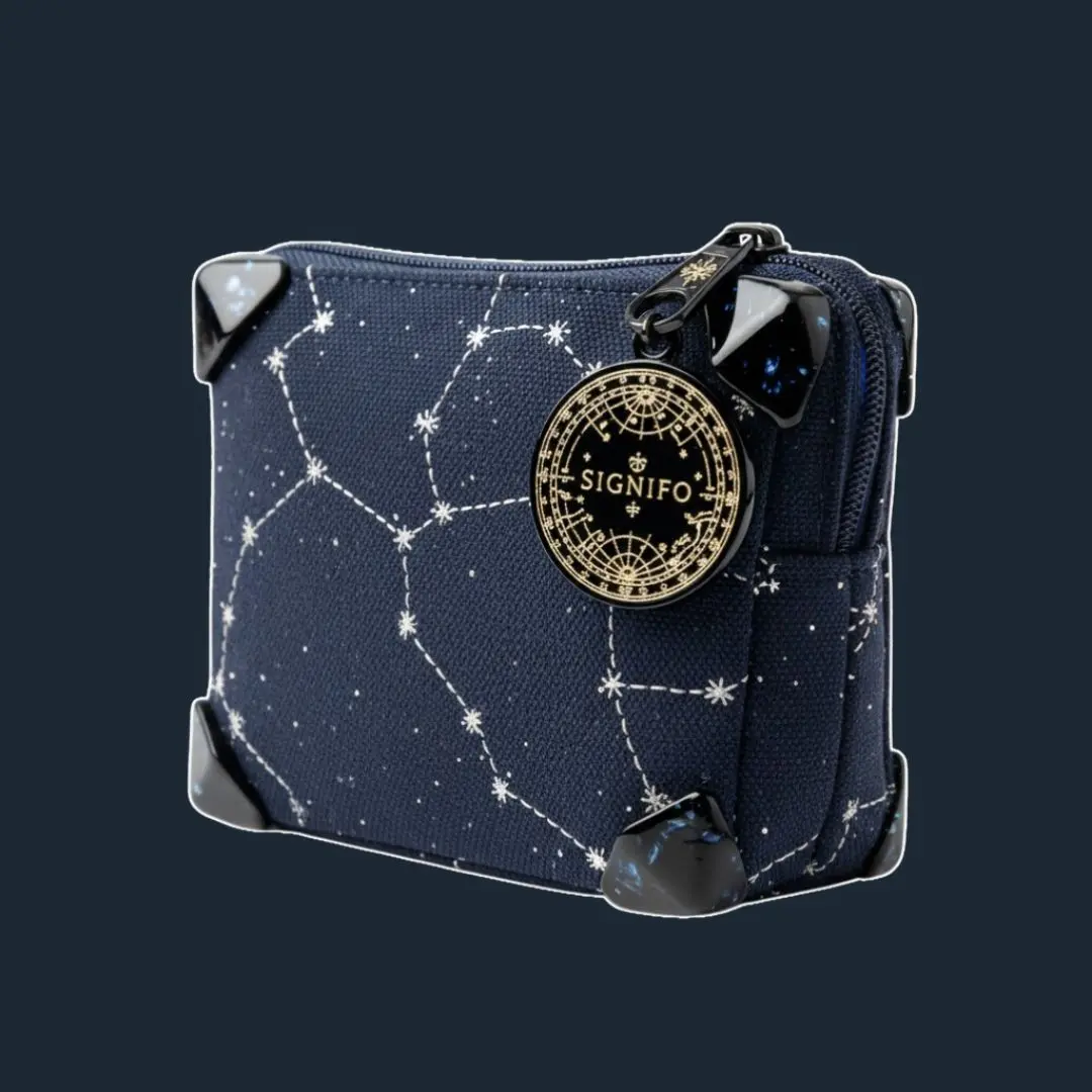 Pouch Starlight Navigators navy dengan motif konstelasi perak.