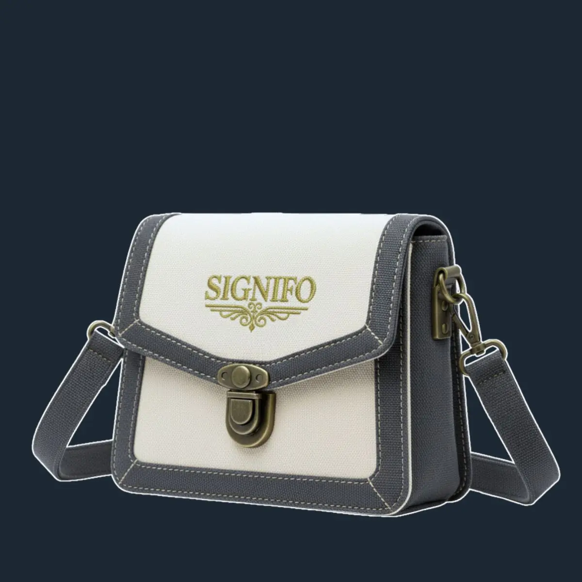 Tas selempang off-white trim abu-abu dan gesper antik.