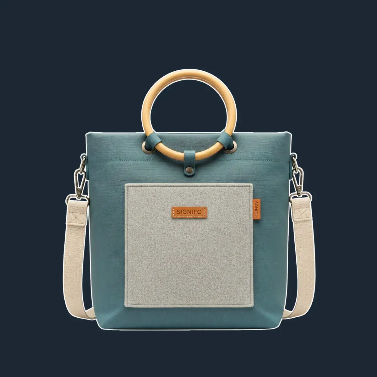 Tas tote teal dengan pegangan kayu dan saku abu-abu.