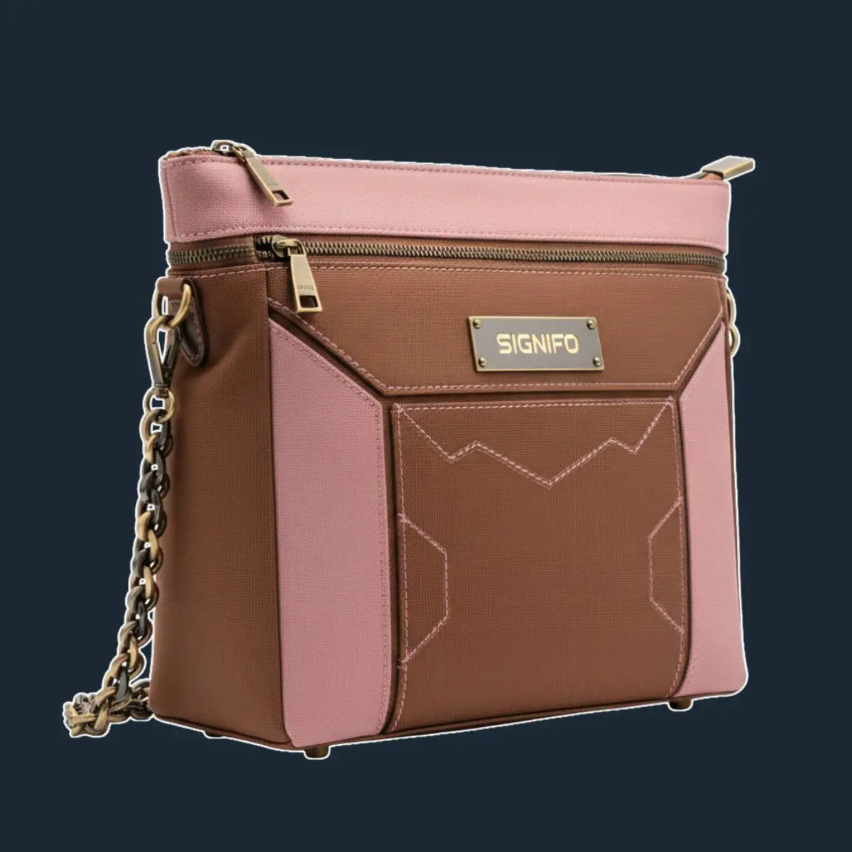 Tas selempang cinnamon brown dan merah muda dengan pola geometris dan rantai.