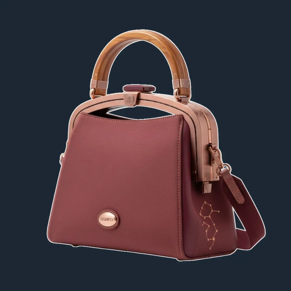 Tas tangan SIGNIFO merah marsala dengan frame tembaga dan bordir bintang.