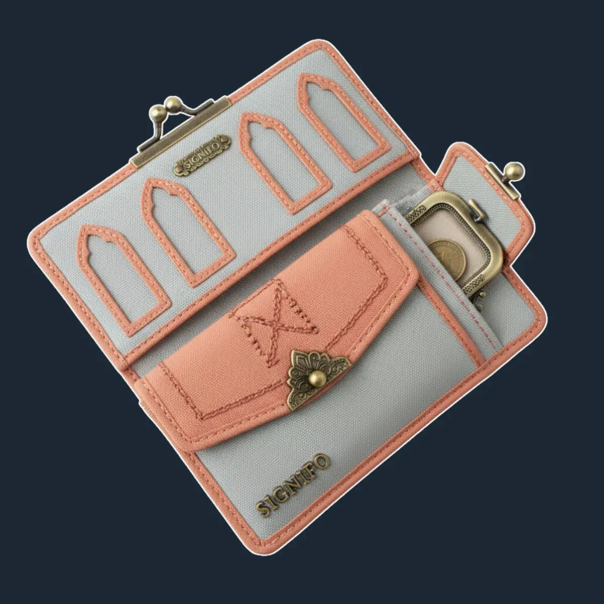 Dompet lipat abu-abu pastel dengan interior coral dan slot kartu melengkung.