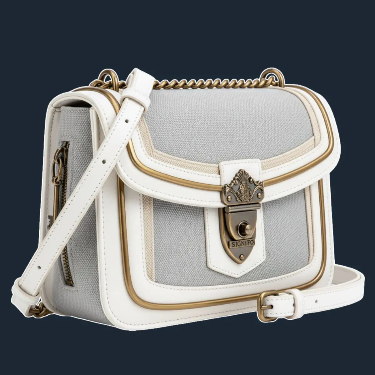 Tas selempang abu-abu pastel dengan trim putih dan clasp kuningan.