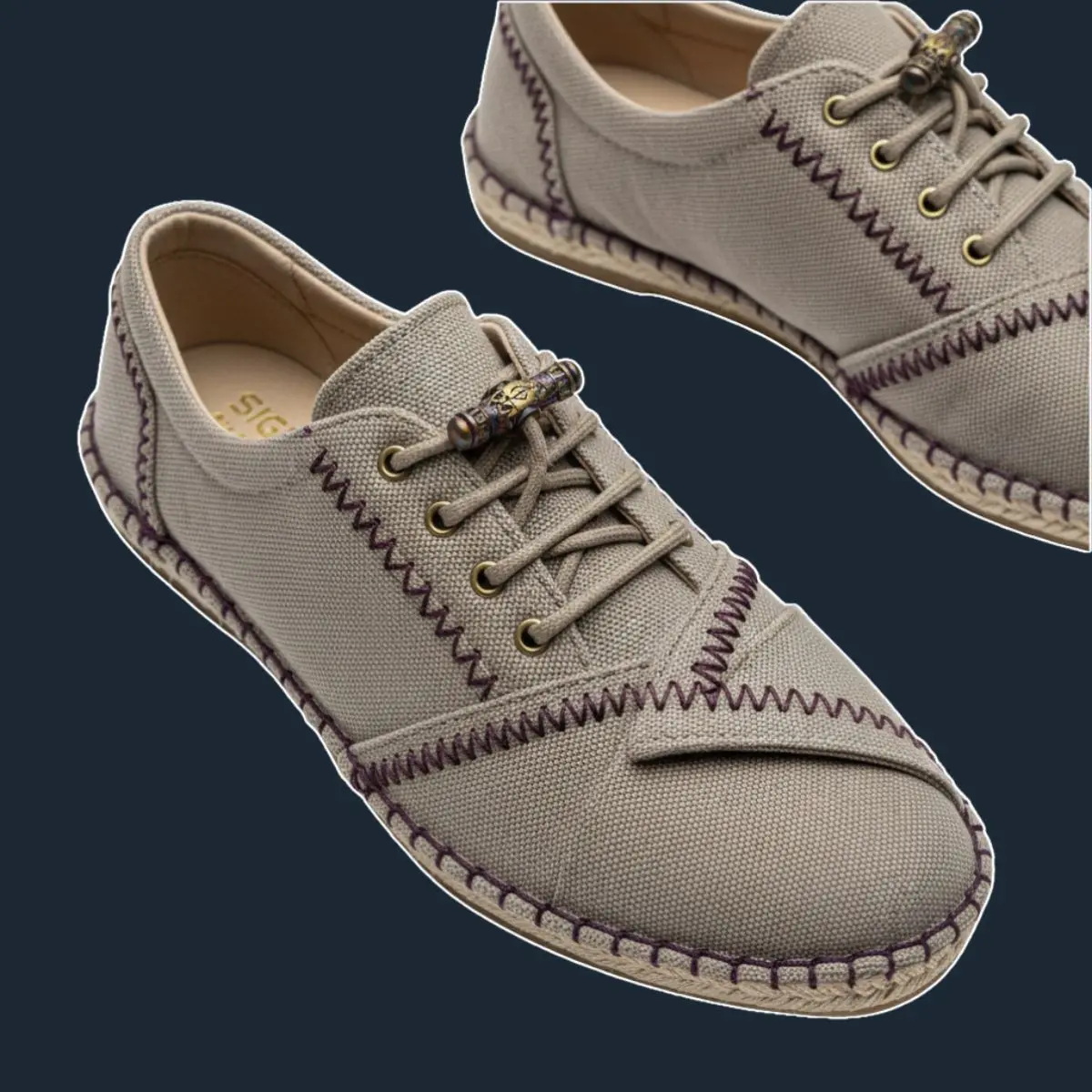 Sepatu Oxford greige taupe dengan jahitan ungu.