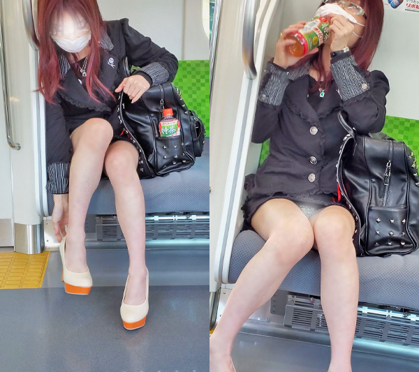 紅い髪の某有名女性シンガーさん？電車対面パンチラ gallery photo 1