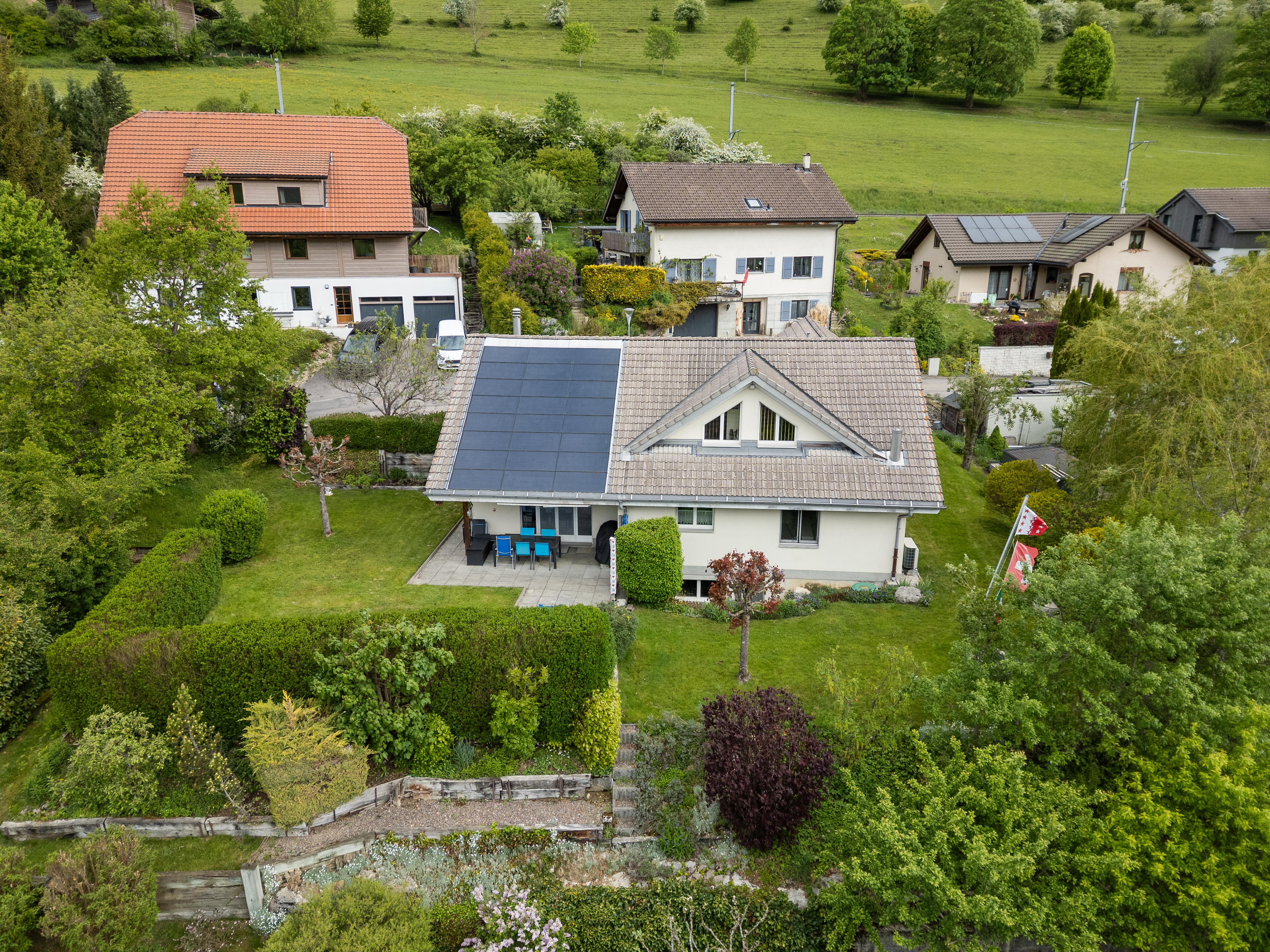 Charmante maison individuelle avec grand jardin et vue dégagée 