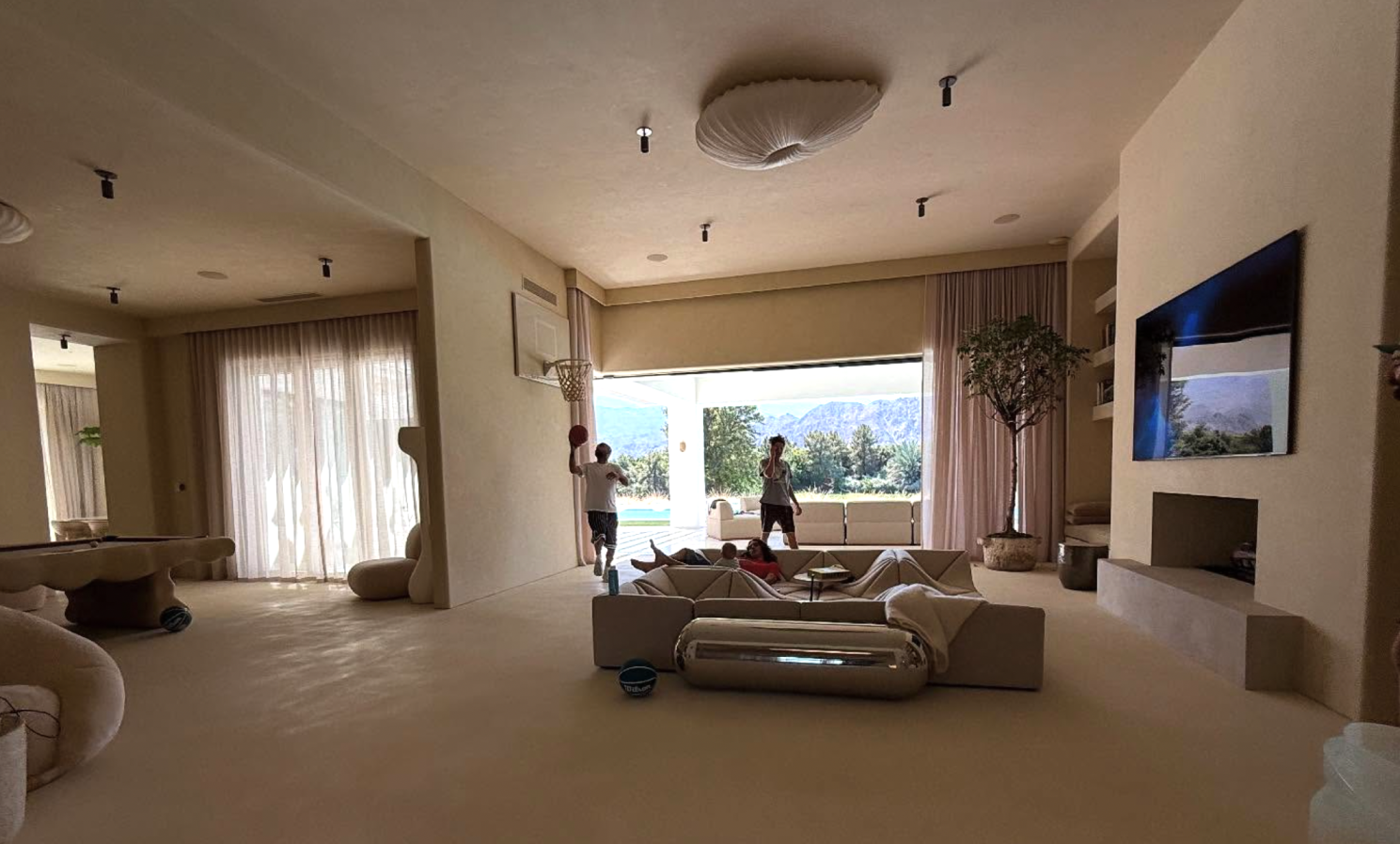 Soft neutral living rooms with sculptural furniture